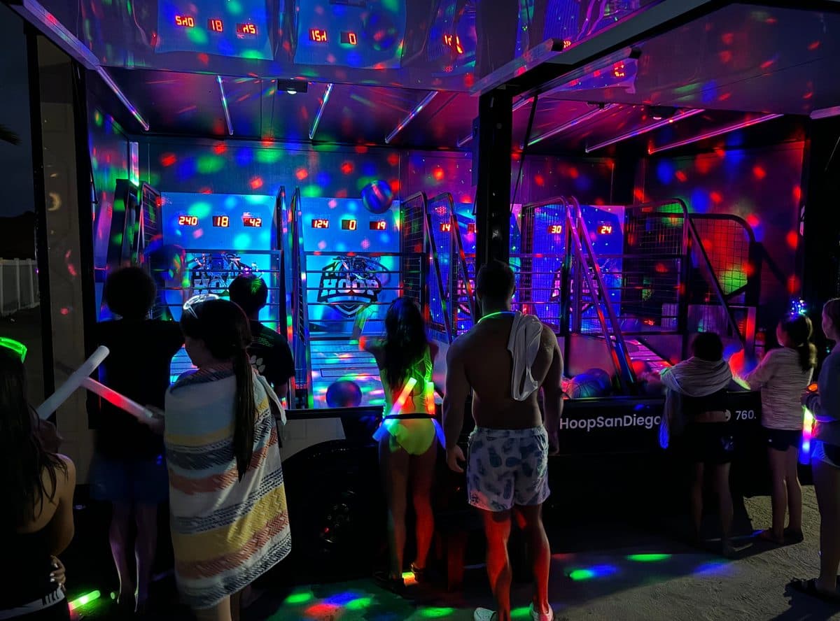 Night glow party with party lights inside the arcade basketball trailer